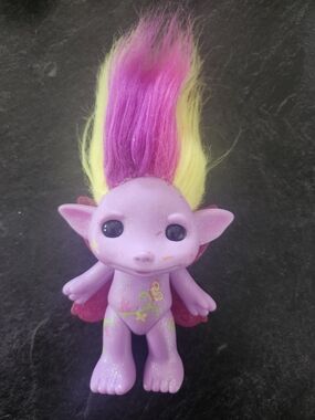The Zelf Buttershy Large Purple Glitter Troll Moose Toys